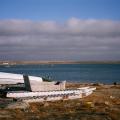 View of Clyde River, Nunavut, Canada including beached komatiks