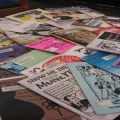 a bunch of zines spread out on a table