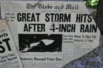 Newspaper headline, "Great Storm Hits after 4-inch rain"