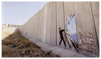 Banksy art on apartheid Wall in occupied Palestine